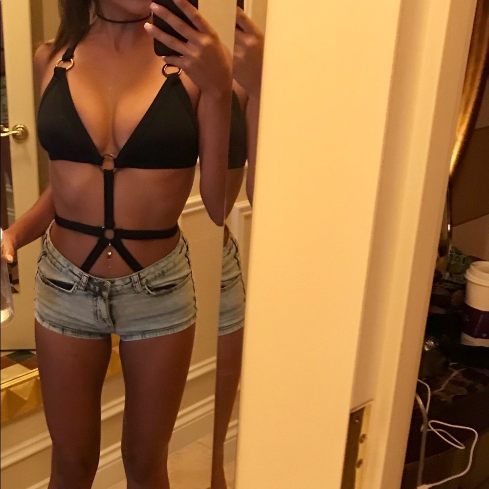 One piece strappy black suit